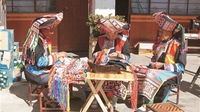 “花傈僳”的俏服饰走出深山
